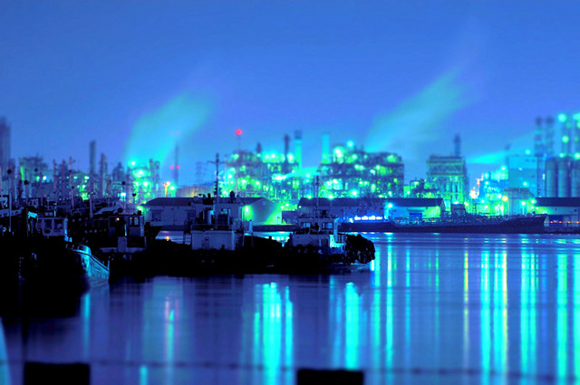 Blue light from a chemical complex is reflected on the surface of a canal