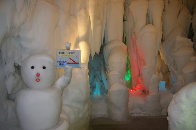 A snowman and giant icicles in the Ice Pavilion in Kamikawa