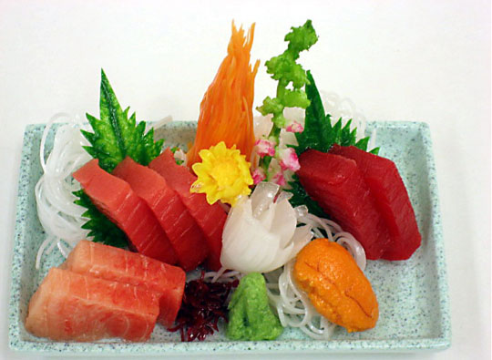 A plastic replica of a plate of sashimi