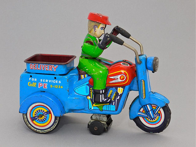 A delivery tricycle tin toy