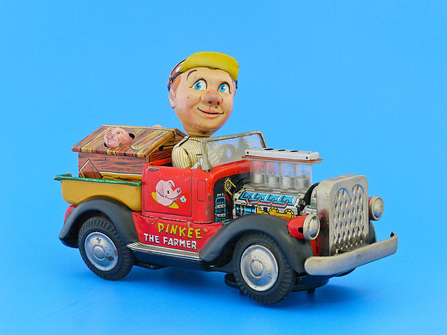 A Japanese tin toy showing a farmer in a truck
