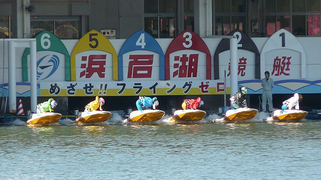 Six boats leaving the docks at Lake Hamana kyotei stadium