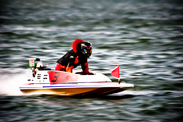 A powerboat during a night race at Kiryu BOAT RACE stadium