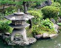 A stone lantern in a Kyoto ryokan garden