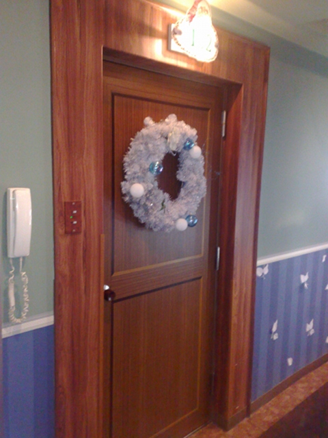 The door to a room at Hotel Chapel Christmas