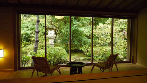 A view from inside a ryokan, out to a garden