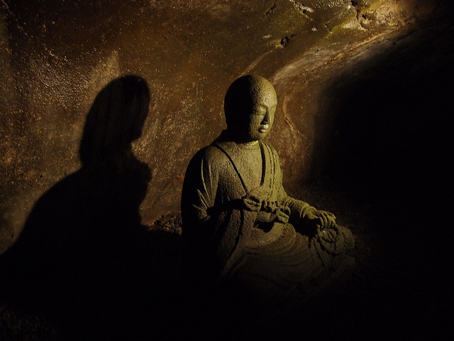 A statue of the Buddha in the Iwaya Caves on Enoshima Island